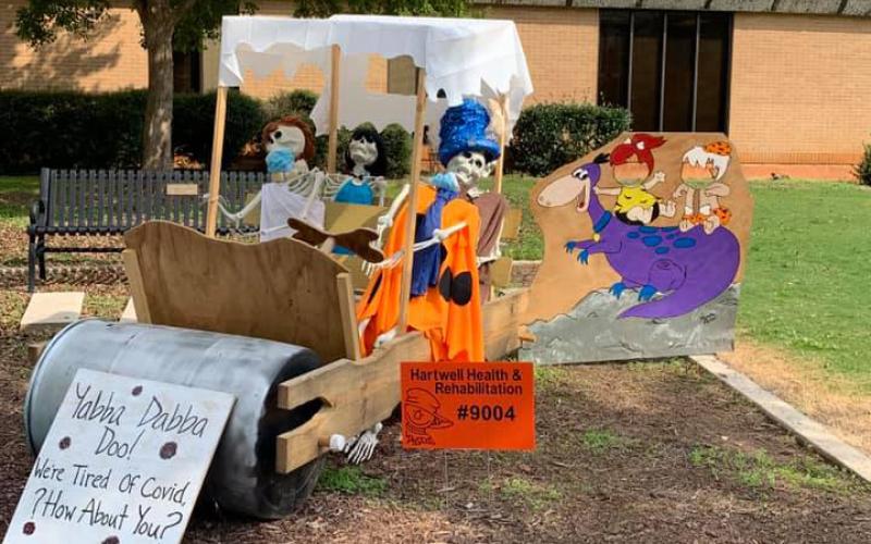 The second-place winning scarecrow — Flintstones.