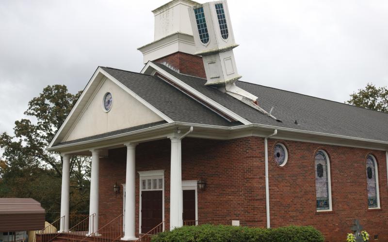 Sunshot by Grayson Williams - The steeple at Shoal Creek Baptist Church in Hart County was blown over by gusty winds from Tropical Storm Zeta.