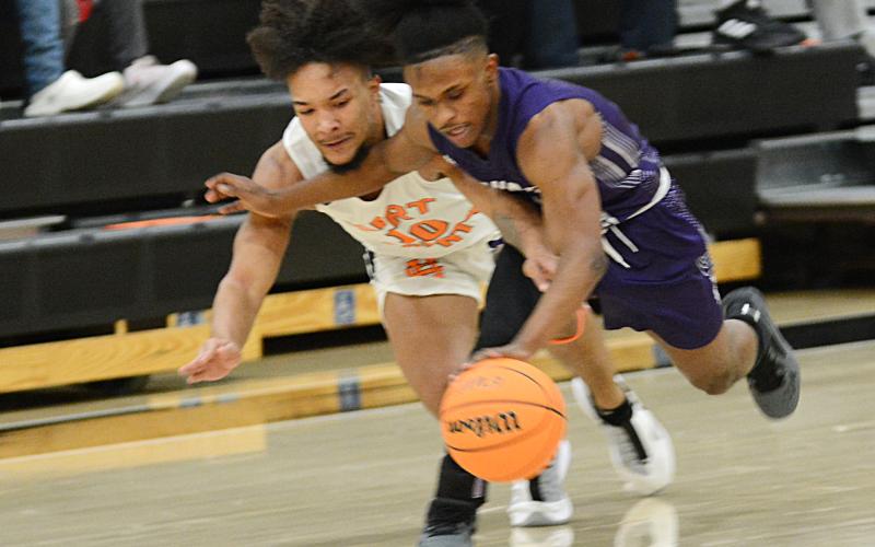 Sunshot by Michael Hall Sean Teasley goes after a loose ball on Friday, Jan. 8, at Hart County High School in the Bulldogs’ win over Monroe Area.