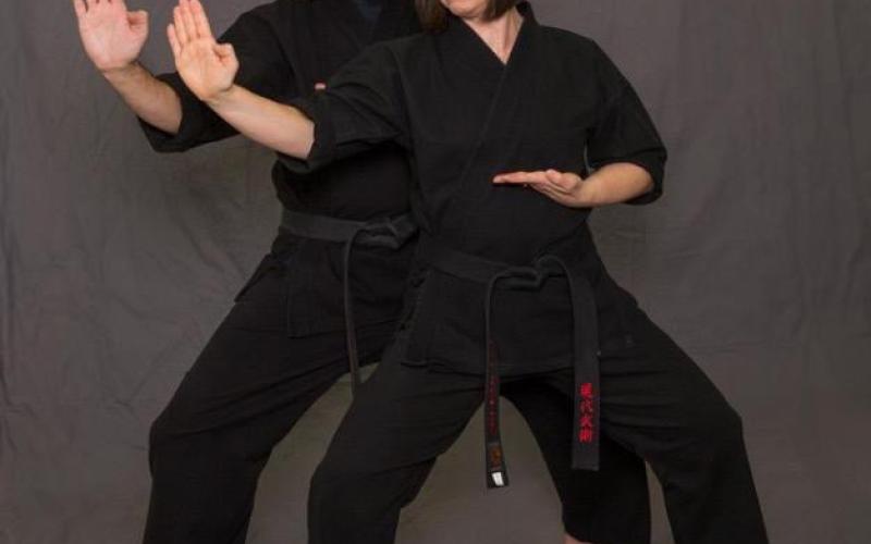 Photo submited/Stephanie Crump photography Chuck and Caroline Cawthon illustrate martial arts movements in a photo.