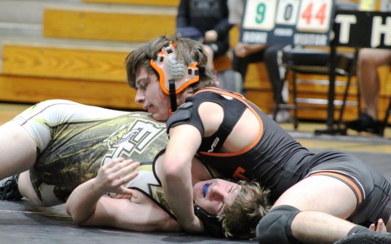 Photo submitted by Mandy Patton - Zander Bradsher wrestles against an opponent at a meet on Jan. 5.