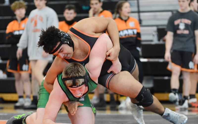 Sunshot by Michael Hall - Quanterrio Hyman manhandles a Murray County wrestler on Saturday, Jan. 23, at Hart County High School in the Mat Dogs’ victory in the team duals wrestling state preliminary tournament.
