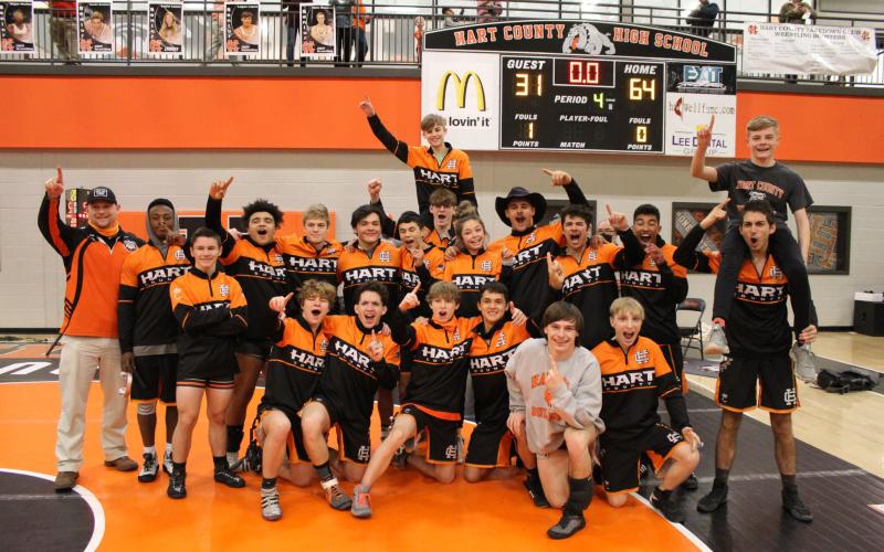The Hart County Mat Dogs celebrate their victory over Murray County and Lumpkin County in the state wrestlig duals preliminary tournament on Saturday, Jan. 23, at Hart County High School, earning them a berth in the state duals tournament this coming Saturday at Cherokee Bluff. Winning sectionals puts the Mat Dogs among the final eight duals teams in the state.