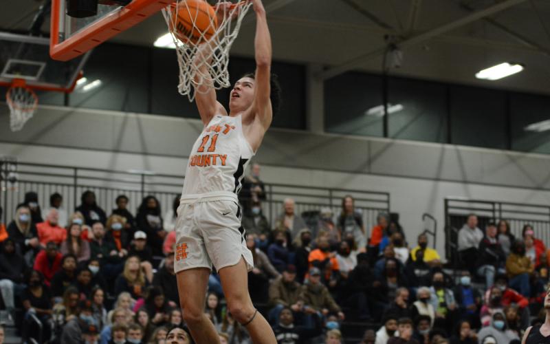 Sunshot by Grayson Williams - J.C. Curry throws down a dunk last week at Hart County High School in the Bulldogs’ win over rival Franklin County to finish an undefeated season in Region 8-AAA play.