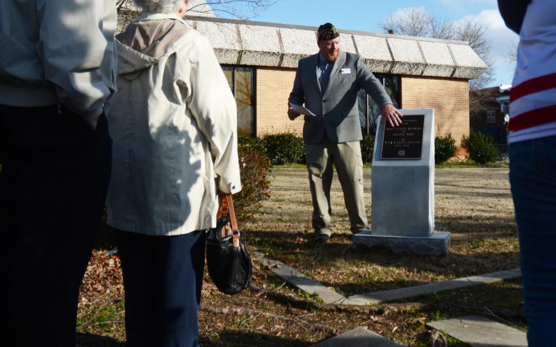 Patrick Wireman rededicates the VFW Auxiliary memorial at Veterans Memorial Park on the Hart County Courthouse Square on Friday, Feb. 19.
