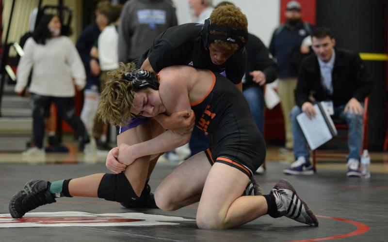 Sunshot by Grayson Williams Memphis Wright wrestles a Monroe Area opponent on Saturday, Feb. 6, at Stephens County High School in the Region 8-AAA traditional wrestling tournament.