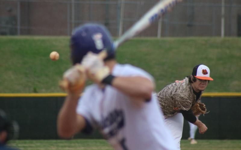 Sunshot by Grayson Williams - Hart County pitcher Casey Tallent deals from the mound against Monroe Area on Friday, March 19.