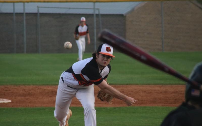 Hart County pitcher Casey Tallent deals from the mound in the seventh inning to close out the 3-1 victory over rival Franklin County at home on Tuesday, March 30.