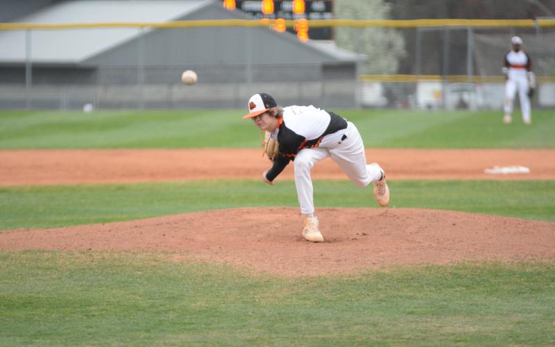Hart County’s Tanner Ayers deals in the 15-0 region victory over Monroe Area on March 15 at Hart County High School.
