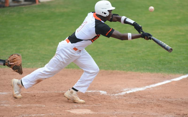 Malachi Thomas attempts to laydown a bunt.