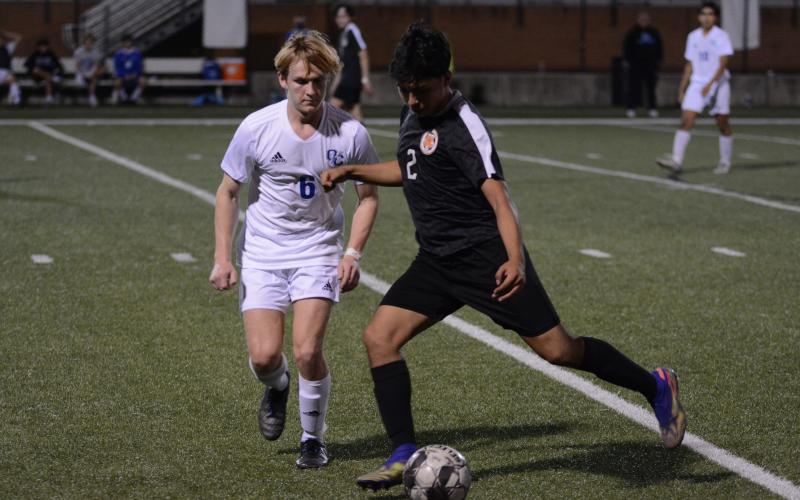 Sunshot by Drew Dotson - Alejandro Rangel kicks the ball at Hart County High School on Friday, March 12, in Hart County’s loss to Oconee County.