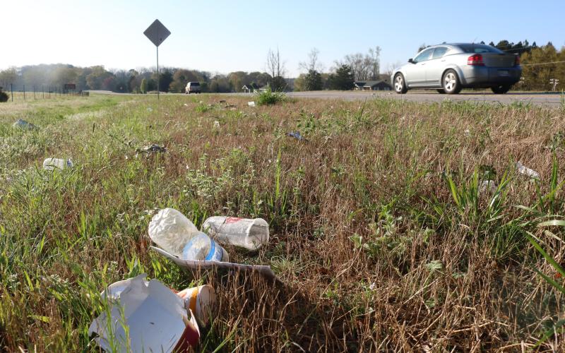 Sunshot by Grayson Williams - Litter on the side of state route 77 is shown. Officials are hopeful prison work crews will return soon to help clean up sides of roadways for the first time in more than a year.