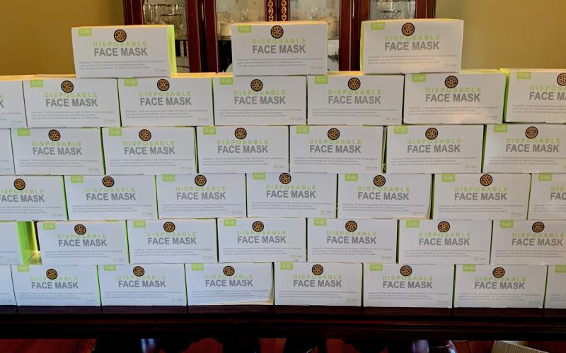 Photo submitted - Dozens of boxes of face masks, shown above, were distributed by local Rotarians.
