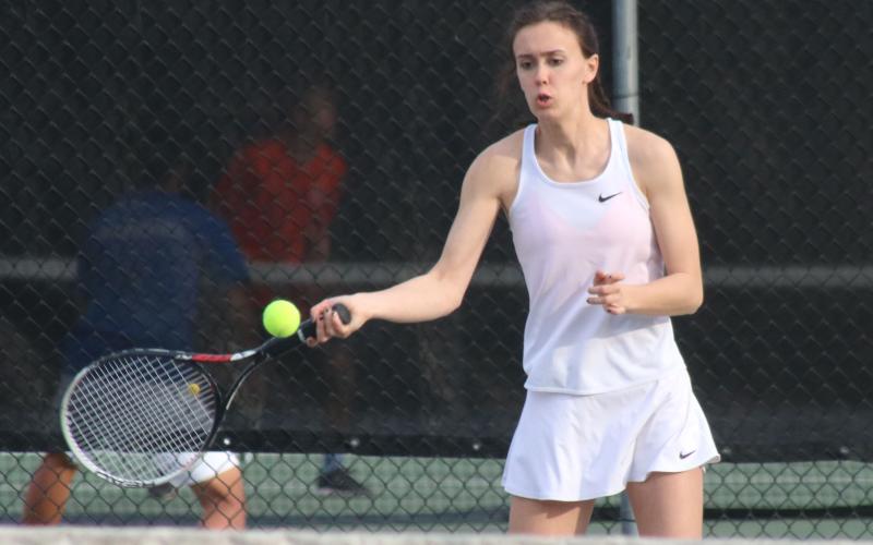 Hart County’s Sydney Smith returns a volley against Oconee County on Tuesday, March 9, at Hart County High School.