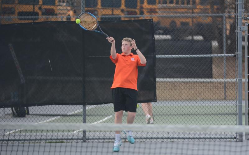 Michael Floyd returns a volley in the Racket Dogs’ win over Commerce.