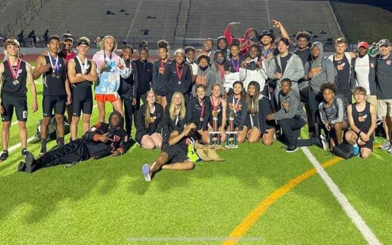 Photo submitted Pictured are both the Hart County boys’ and girls’ track teams after they each took home first-place trophies from the Battle of the Blue Ridge meet at Habersham Central on Friday, March 26.