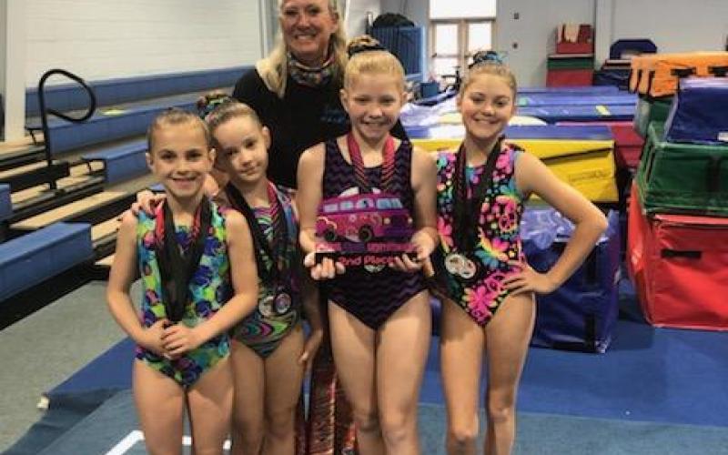 Pictured from left to right, front, are Tinsley Starrett, Aeryn Back, Chastyn Haynie, Bella Beck, back, head coach Shellye Ayers.