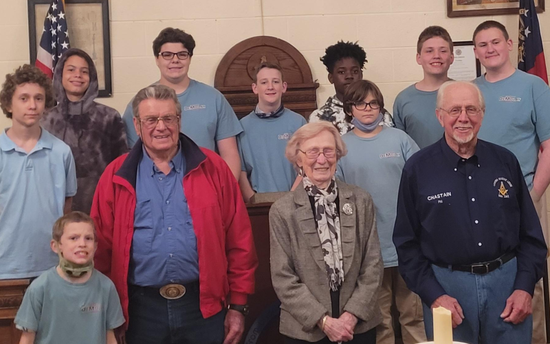 The young men of DeMolay Chapter 11095 (LT) surround guest speakers, pictured center from left to right, Bill Pankey, Margaret Ayers and Buddy Chastain.