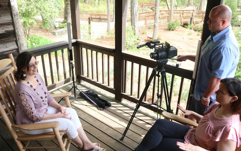 Sunshot by Grayson Williams - Producers Heather Andolina, seated right, and Andrew Gillen, standing right, interview Nixon.