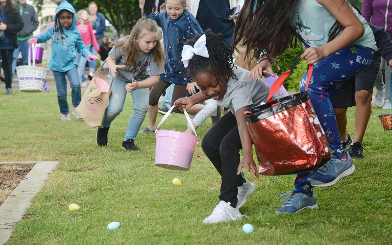 Sunshot from file: Amiracle Roebuck, 5, finds room to grab an egg during the Hart County Chamber of Commerce’s annual Easter egg hunt in 2019.