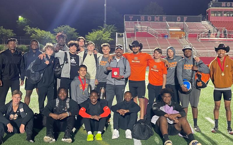 The Hart County High School boys track team is pictured holding a second-place plaque at the North Oconee Titan Invitational.