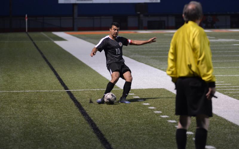 Sunshot by Grayson Williams Renso Escobedo fires a pass in the Bulldogs’ 8-1 senior night victory over Lincoln County on Friday, April 16 at Hart County High School.