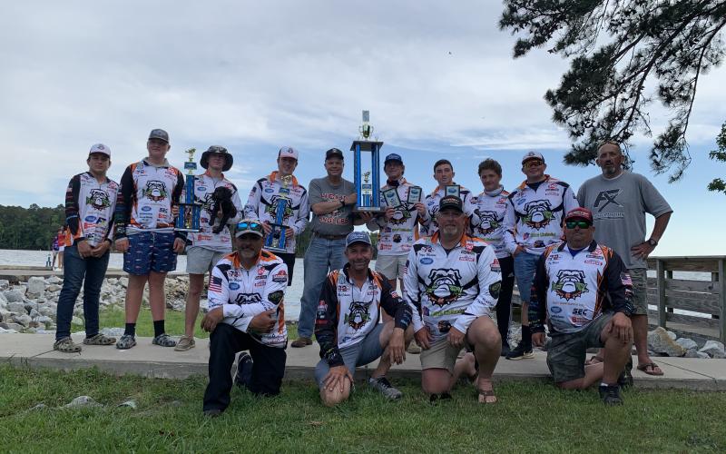Pictured are team members and coaches who participated on Lake Murray holding the trophy. Pictured from left to right, top row, are Austin McCall, Xander Patton, Tallis Morrison, Max Heaton, coach Matt Beasley, Dallas Hancock, Dawson Carden, Griffin Milford, Austin Mercer, Joe Carden. Bottom row: Charlie Milford, Mark Johnson, Hayes Morrison and Tim Mercer.