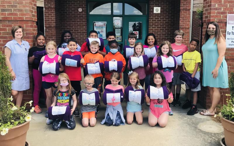 Pictured front row:  Lyla McGehee, Brayden Freeman, Daylin McCann, Kinsley Stallings, Vanessa Sanchez. Pictured middle Row:  Khloe Dowell, Nolan Franco, Keylin White, Brayliee Hickman, Reagan Johnson, Phoebe Tauber, Brendenn Norman. Pictured back row: Second grade teacher, Crystal Kearns,  Adrianna Rucker , Za’Corri Maddox, Mason Tate, Javion Bonner, Jay Isbell, Gabi Jackson, Townes Anderson, NEGACDV representative, Kristen  Jackson