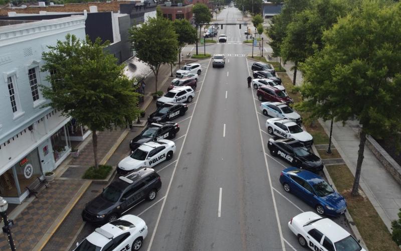 Submitted photo - Hartwell police line both sides of Howell Street near Southern Hart Brewery on June 2.