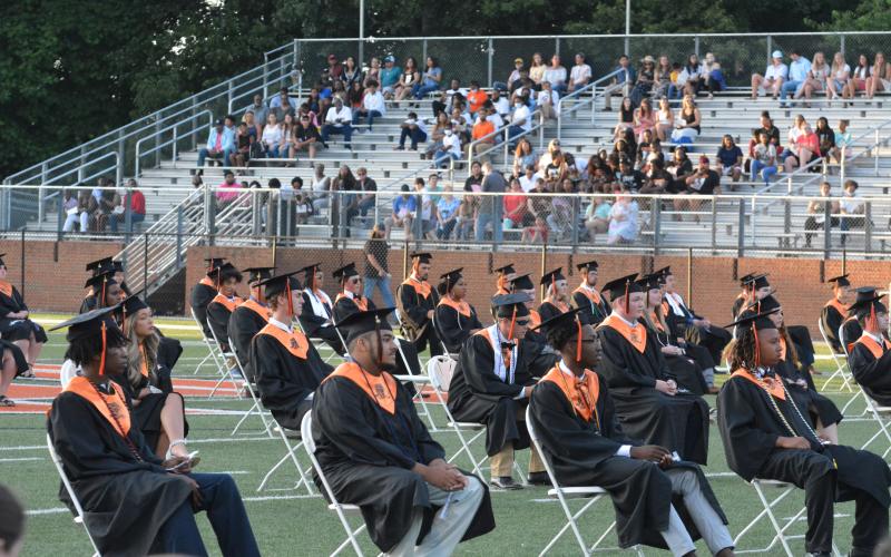 Drew Dotson/The Hartwell Sun - The Class of 2021 spends its final moments of high school at the football stadium.