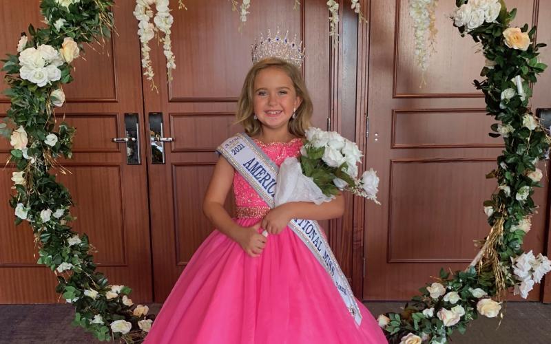 Submitted photo - Andie Jane Holmes grins after being crowned ‘National Young Miss in Atlanta on June 12.