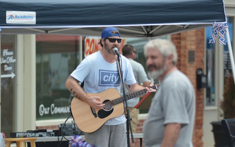 File photo - Musician Phil Duncan entertains Hartwell during the 2019 Pre-Fourth festival.