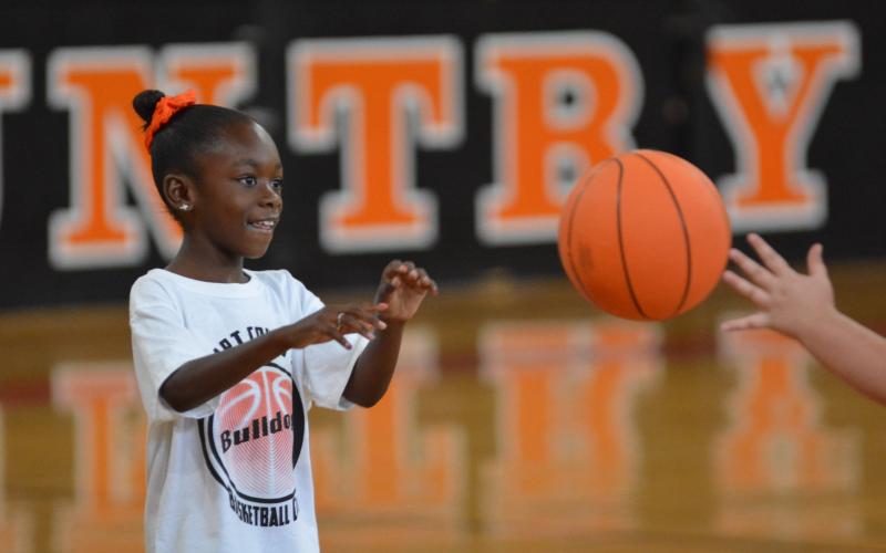 Brooklyn McIntosh checks the ball in a friendly one-on-one.