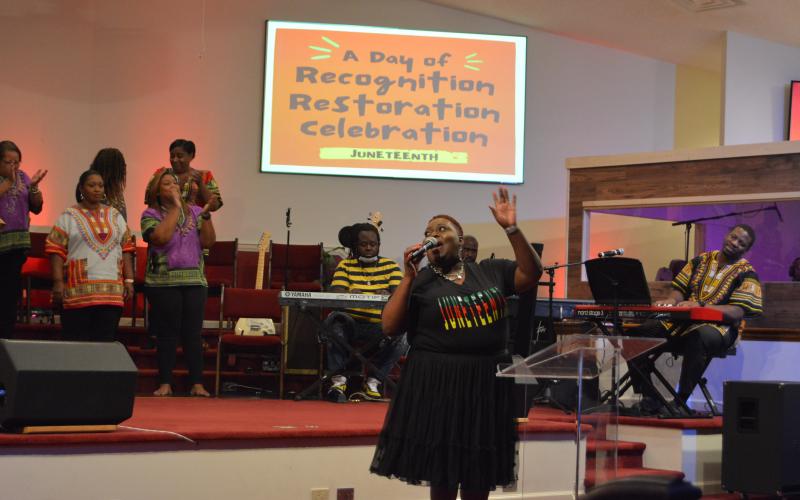 Drew Dotson/The Hartwell Sun - The Juneteenth Celebration Choir leads a Juneteenth praise service at the Christian Worship Assembly on Saturday.