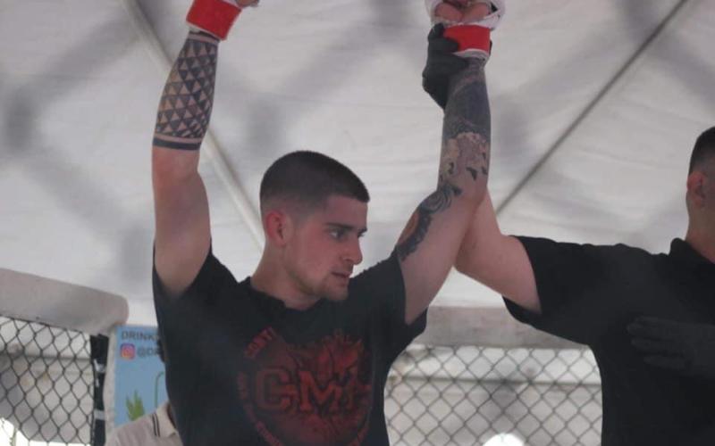 Submitted photo - Christian Hardin is named the victor by unanimous decision