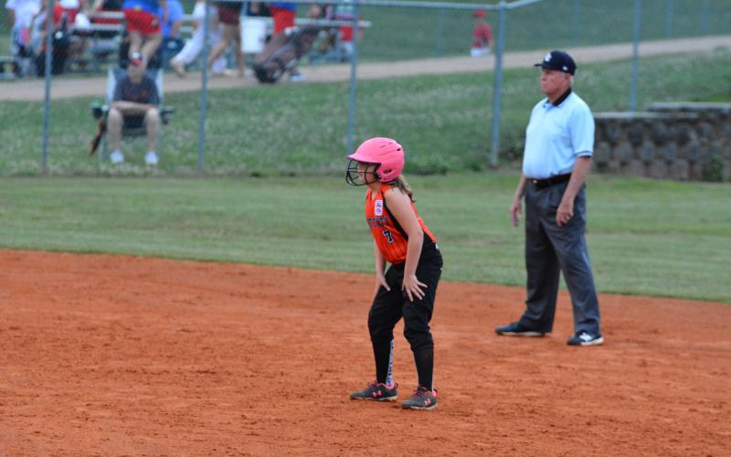 Drew Dotson/The Hartwell Sun - Tailor Mealor prepares to steal third base at the sectionals tournament on June 9 at the Lavonia recreation department..