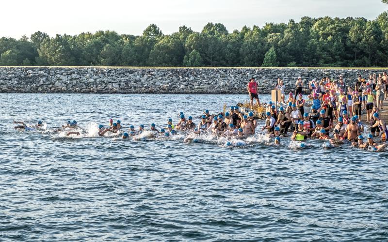 Bill Powell/The Hartwell Sun - Triathletes jump in at Big Oaks  Recreation Area on Lake Hartwell.