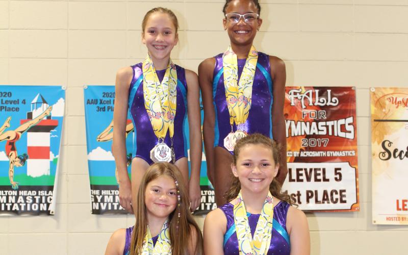 Photo Submitted - Top Row (L to R): Maddie Dault, Cheyenne Rucker. Seated: Bella Beck, Kailyn Bowers
