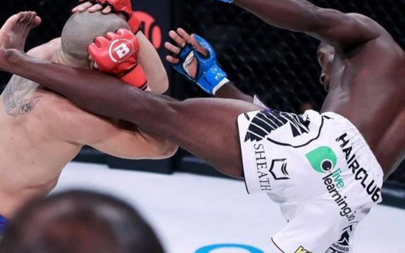 Photo submitted - Hamilton lands a kick on his Matheus Mattos at his first main card event for Bellator.