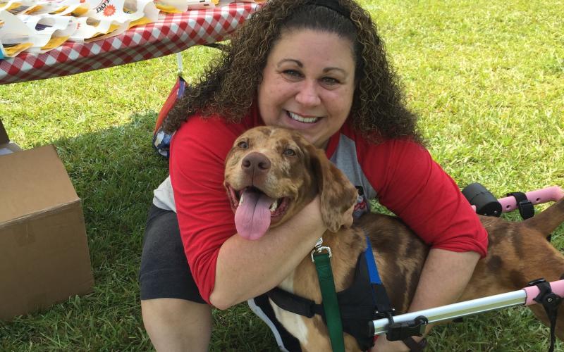 Josh Brannen/The Hartwell Sun - Animal rescue employee Stefanie Sims and her adoptable friend Lucy.