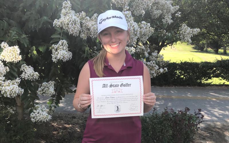 Photo submitted  Weaver poses with her certificate of merit as an all-state golfer.