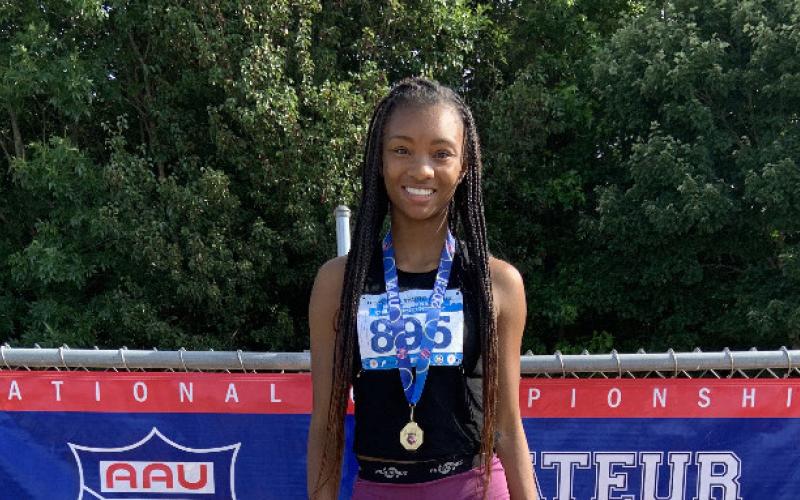 Valasha Carter won first in the triple jump and sixth place in the long jump.