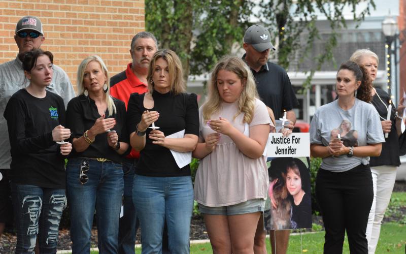 Dozens gathered at the Hartwell courthouse square on July 9 for a vigil in mourning of Jennifer Cobb, who died in connection to alleged sexual abuse.