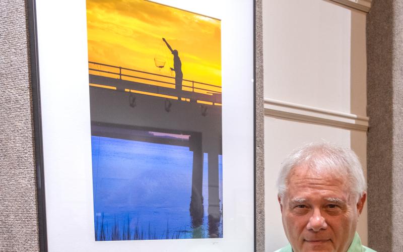 Ron Kennedy’s Crab Man, pictured above, won the Merit Award in photography.