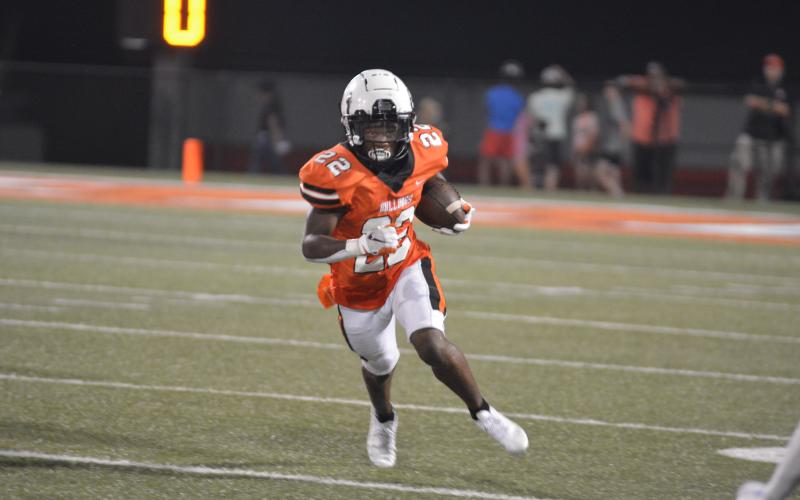 Drew Dotson/The Hartwell Sun - Sophomore running back Nori Moore finds space on the outside in Hart County’s first half against BHP.