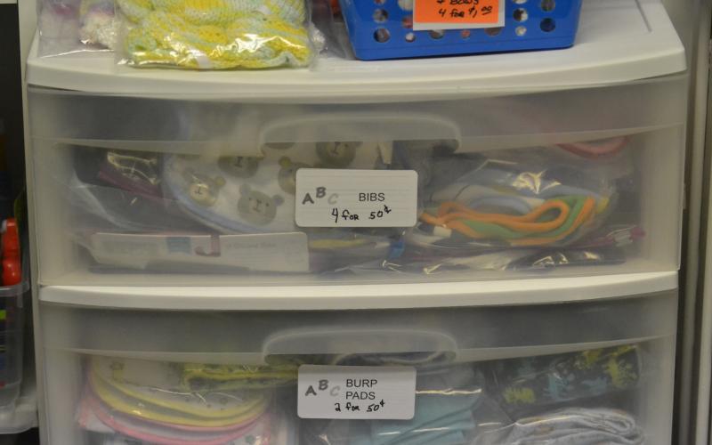Items like bibs, seen above, are available for cheap purchase with participation in the Earn While You Learn program.