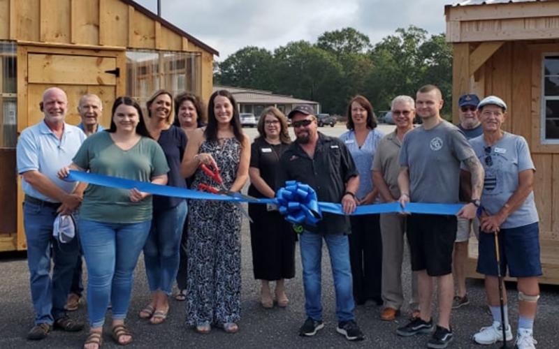 Hart County Chamber of Commerce members gather at 78 Ridge Road for the opening of Storage Master and Wilson Industrial Parts and Outdoors.