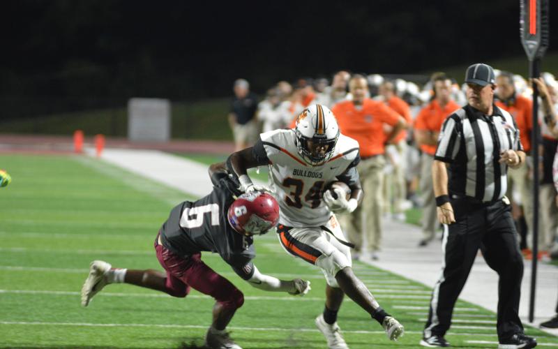 Running back JL Lackey throws down a Westside defender in Anderson, S.C. in one of his five touchdowns on Friday, Sept. 17.