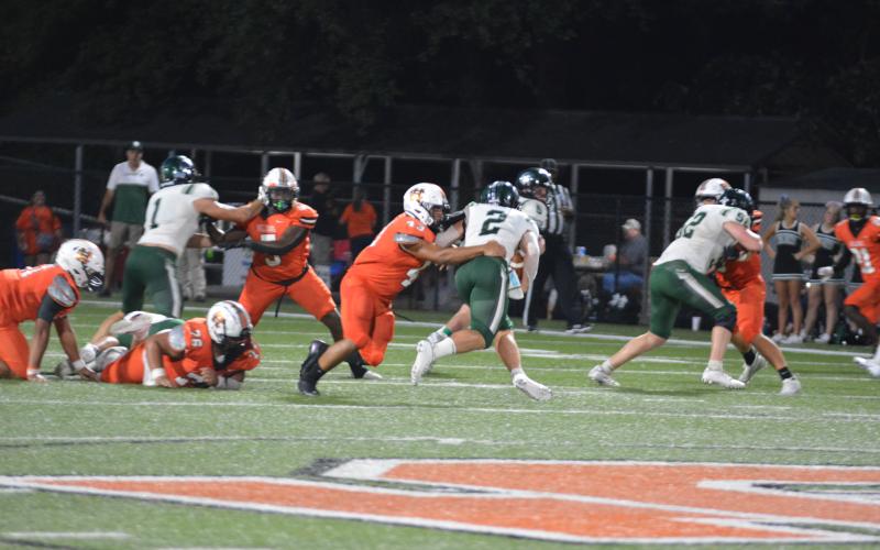 Quatterio Hyman takes down a North Hall runner.