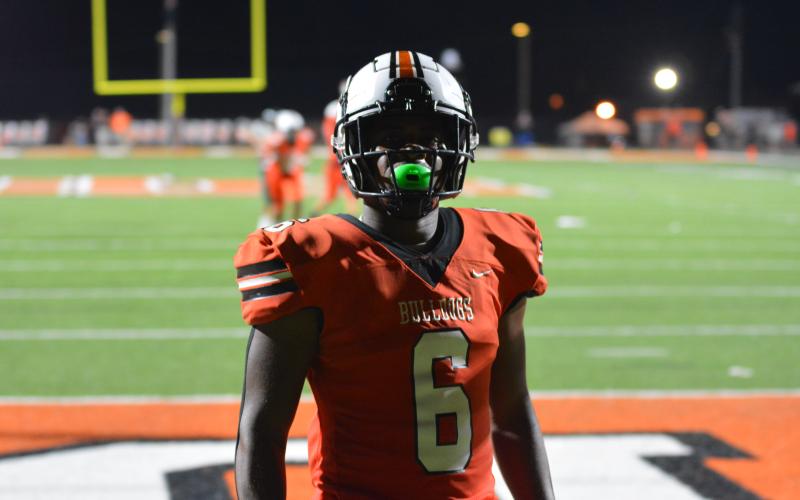 Malachi Kelley poses for the camera after scoring his second touchdown of the night.